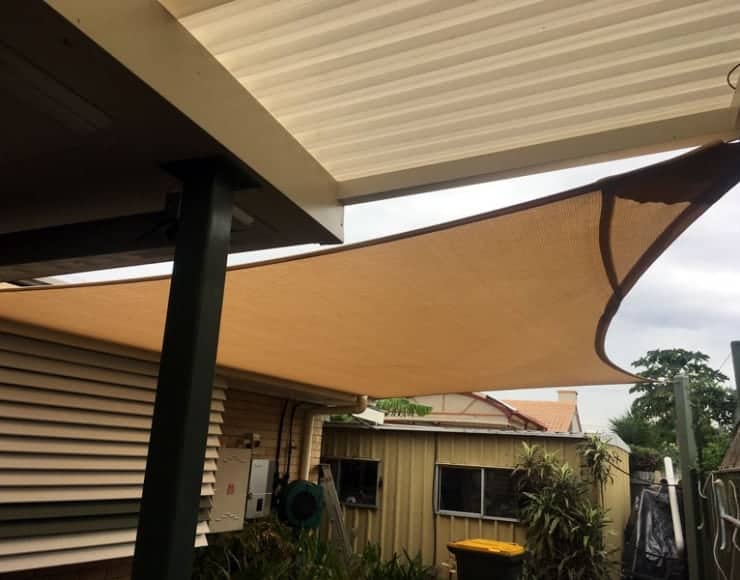 Brisbane shade sails installation at Sunnybank-Patio Brisbane shade sails installation at Sunnybank-Patio entertaining area with sail-track in Abshade Sandstone. Material and galvanised steel posts powder-coated in pale eucalypts.