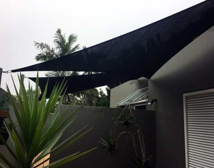 Privacy shade sails installed in Springwood, Brisbane by Superior Shade Sails.