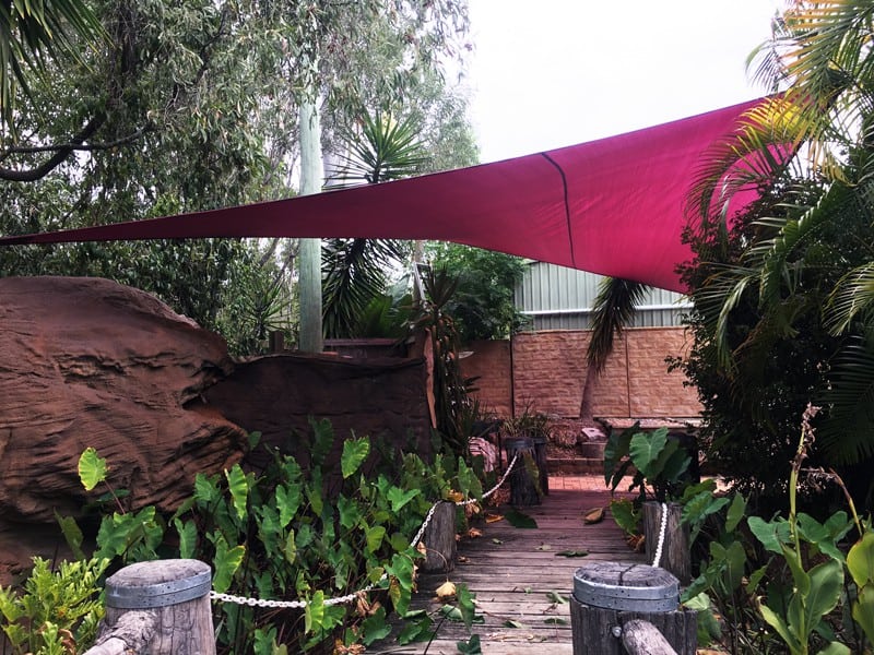 Brisbane shade sail - North Maclean in tropical garden installed by Superior Shade Sails