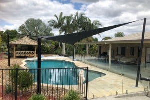 Another Happy Customer - Installed at Forestdale, Brisbane a Pool Shade Sail in a tropical resort style setting with a 1 x 4 point Z-16 sail.