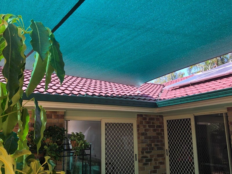 4 point shade sail installed at Forest Lake in Rainforest Green