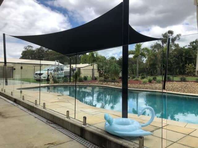 Installed at Forestdale, Brisbane a Pool Shade Sail in a tropical resort style setting with a 1 x 4 point Z-16 sail.