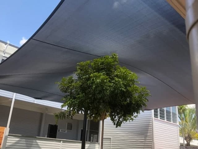 Shade Sail for Ipswich Qld Government School using Monotec 370 in Graphite material on a centre post. installed by Superior Shades.