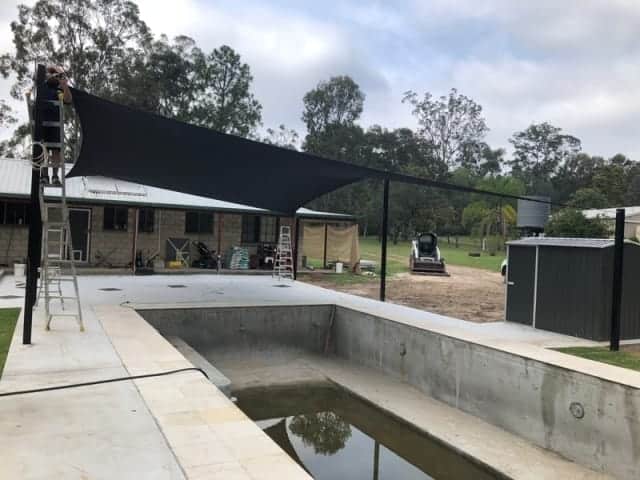 Another Pool Shade sail installation, this time in Logan, south of Brisbane. We set up 6 Point Reverse Hyper Sail with Black Powder Coated posts and Z-16 material in the colour Charcoal.