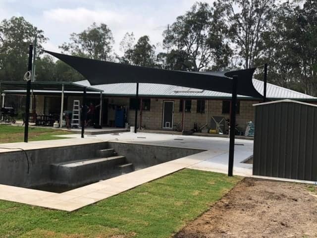 Another Pool Shade sail installation, this time in Logan, south of Brisbane. We set up 6 Point Reverse Hyper Sail with Black Powder Coated posts and Z-16 material in the colour Charcoal.