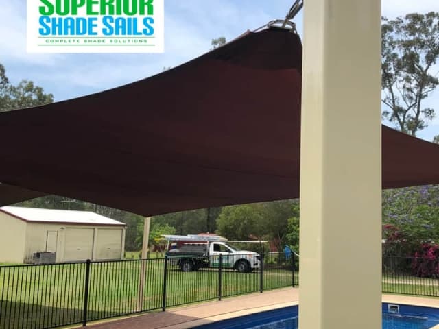 Installed two 5 Point Hyper Shade Sails in Jimboomba. Both sun shade sails in Extrablock Sunblaze with powdercoated steel posts.