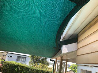 Patio Shade Sail -To keep the family BBQ out of the sun for this Queenslander in Nundah, Brisbane.We used the Rainbow Z-16 sail fabric in the colour Rainforest and 316 marine grade trace wire with two roof brackets attached.