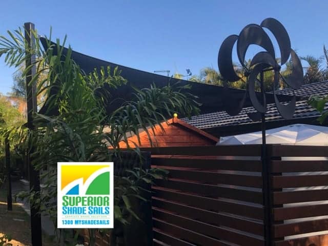 Shade Sail for the play area in this beautiful Bali Style garden in Karalee, Ipswich by Superior Shade Sails