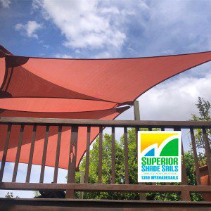 High on a hilltop in the lovely suburb of Tarragindi we installed this triple treat set of shade sails for the Poolside Deck using the Z-16 shade fabric in the Terracotta colour.