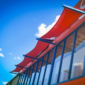 Superior Shade Sails replaced the shade sails at Kennards Hire with bright new ones using Z16 Shade fabric.